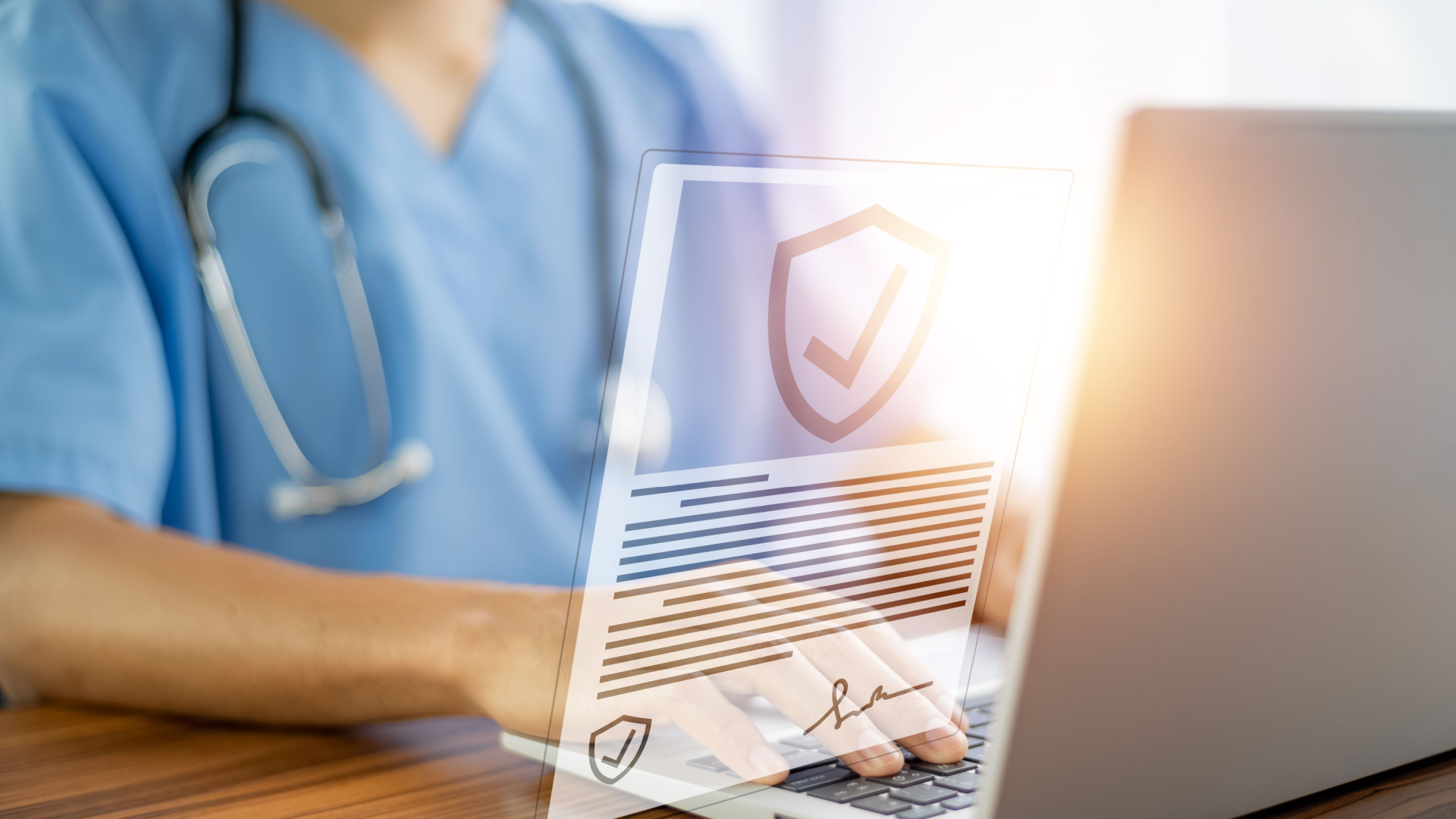 nurse at a computer with a floating graphic of a claim with a checkmark on it